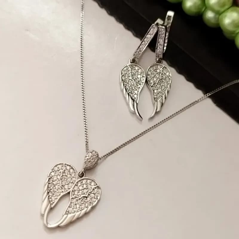 نیم ست نقره زنانه عیار 925 طرح قلب بالدار بدون زنجیر — تصویر ۳