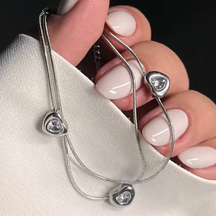 دستبند زنانه و دخترانه استیل طرح دولاین قلب ضد حساسیت رنگ ثابت کد atk