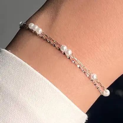 دستبند زنانه و دخترانه استیل طرح دولاین مرواریدی ضد حساسیت رنگ کاملا ثابت کد atk