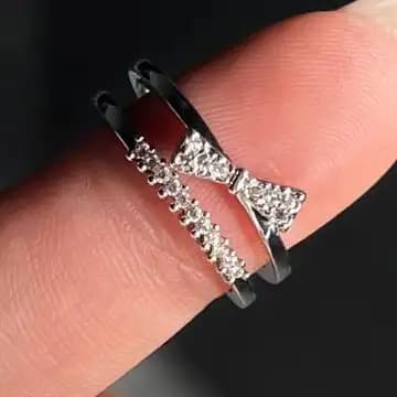 انگشتر زنانه و دخترانه جواهری طرح دولاین پاپیون ضد حساسیت رنگ ثابت فری سایز کد atk