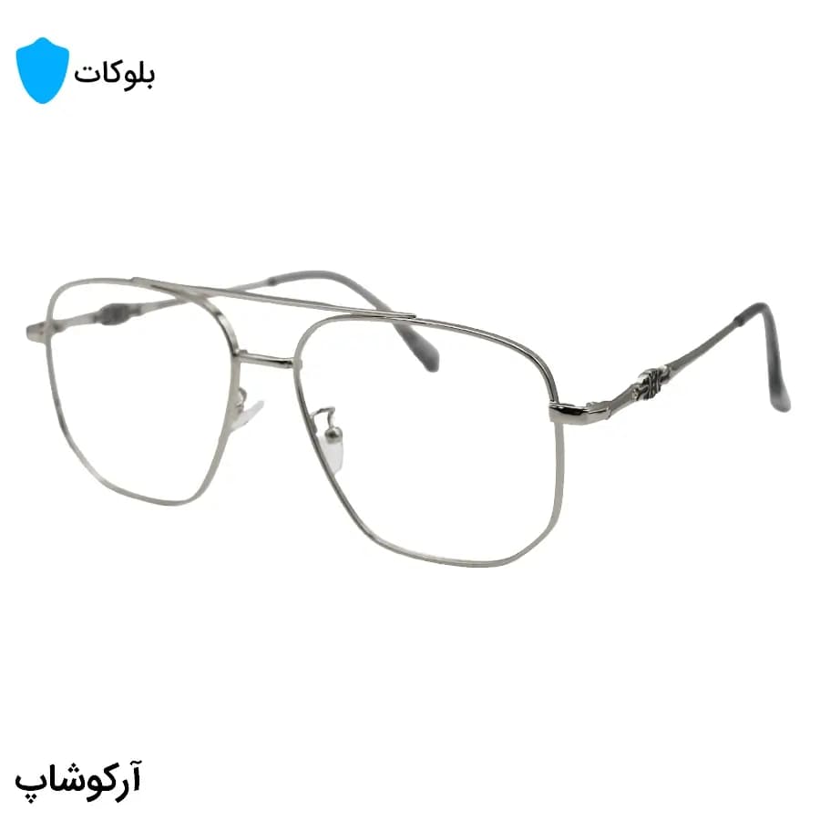 عینک برند Chrome Hearts با فریم شکل چندضلعی، رنگ نقره‌ای براق و لنز بی‌رنگ و شفاف (بلوکات) مدل 23091