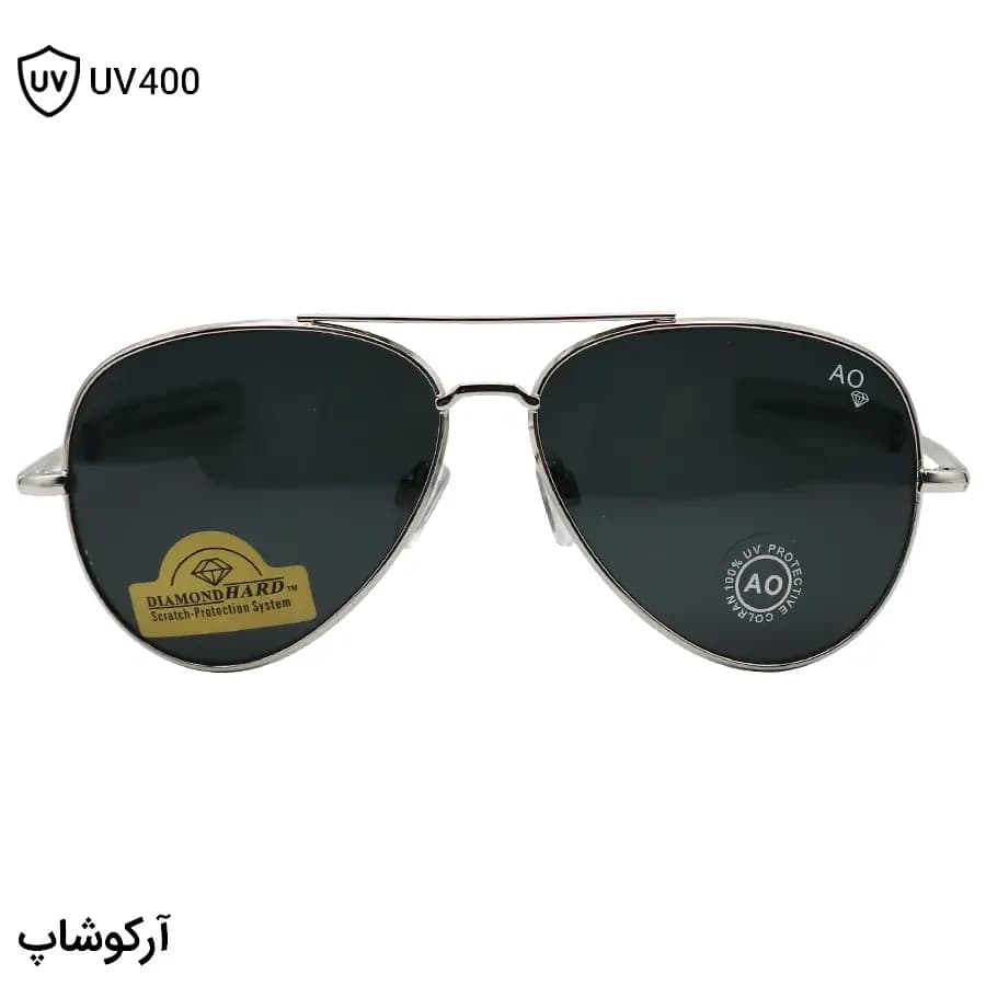 عینک آفتابی American Optical با فریم خلبانی، رنگ نقره‌ای براق، عدسی جنس سنگ (شیشه) و دودی تیره مدل AO-1004 — تصویر ۳