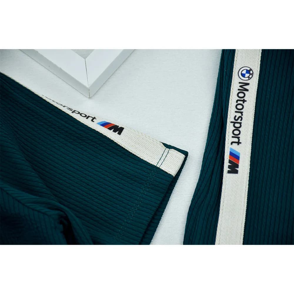 ست تیشرت و شلوار پسرانه تینیجری طرح BMW جنس بیسکویتی پلی استر — تصویر ۳