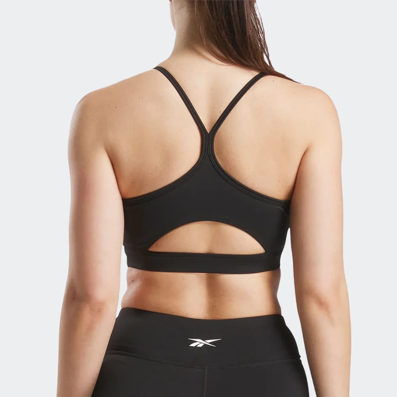 نیم تنه زنانه ریباک مدل ID Train Tri-Back Sports Bra — تصویر ۳