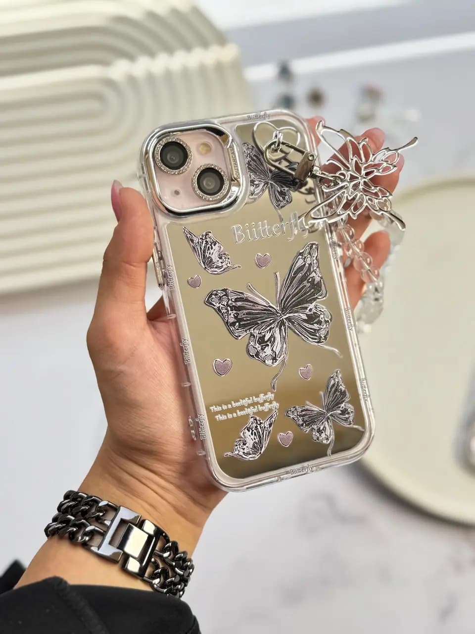 قاب butterfly آینه ای با محافظ لنز رینگی و آویز چسبی (کدC1804) — تصویر ۲