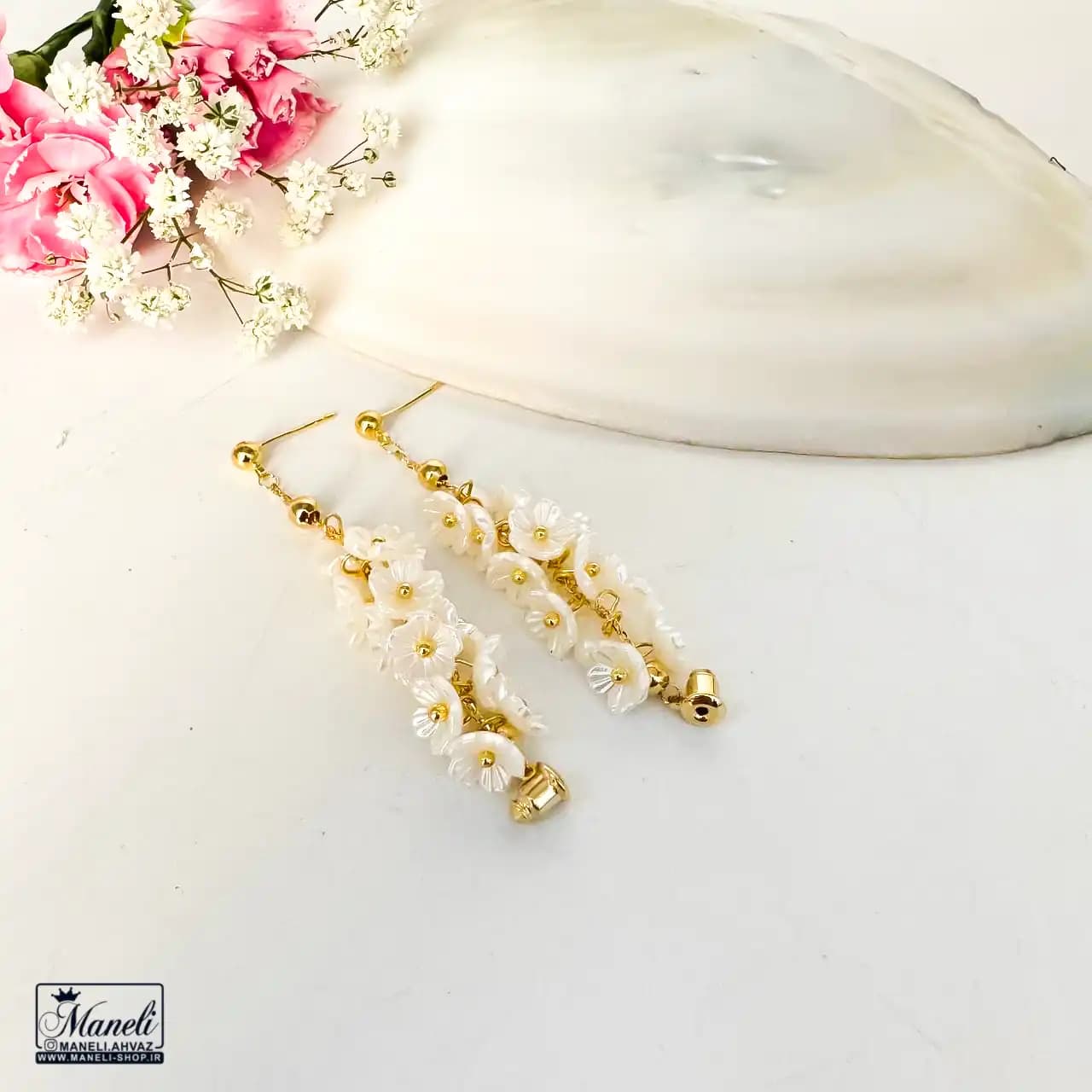 گوشواره طرح گل استیل رنگ ثابت | آبکاری درجه یک 14030591 — تصویر ۴