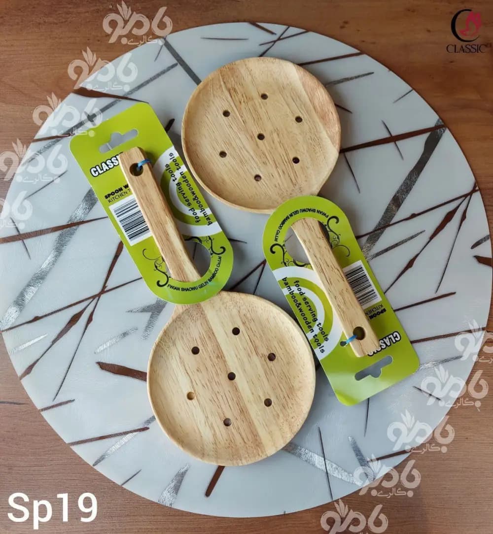 کفگیر چوبی کلاسیک گرد سوراخ پهن بزرگ 25*12 کد sp19 — تصویر ۲