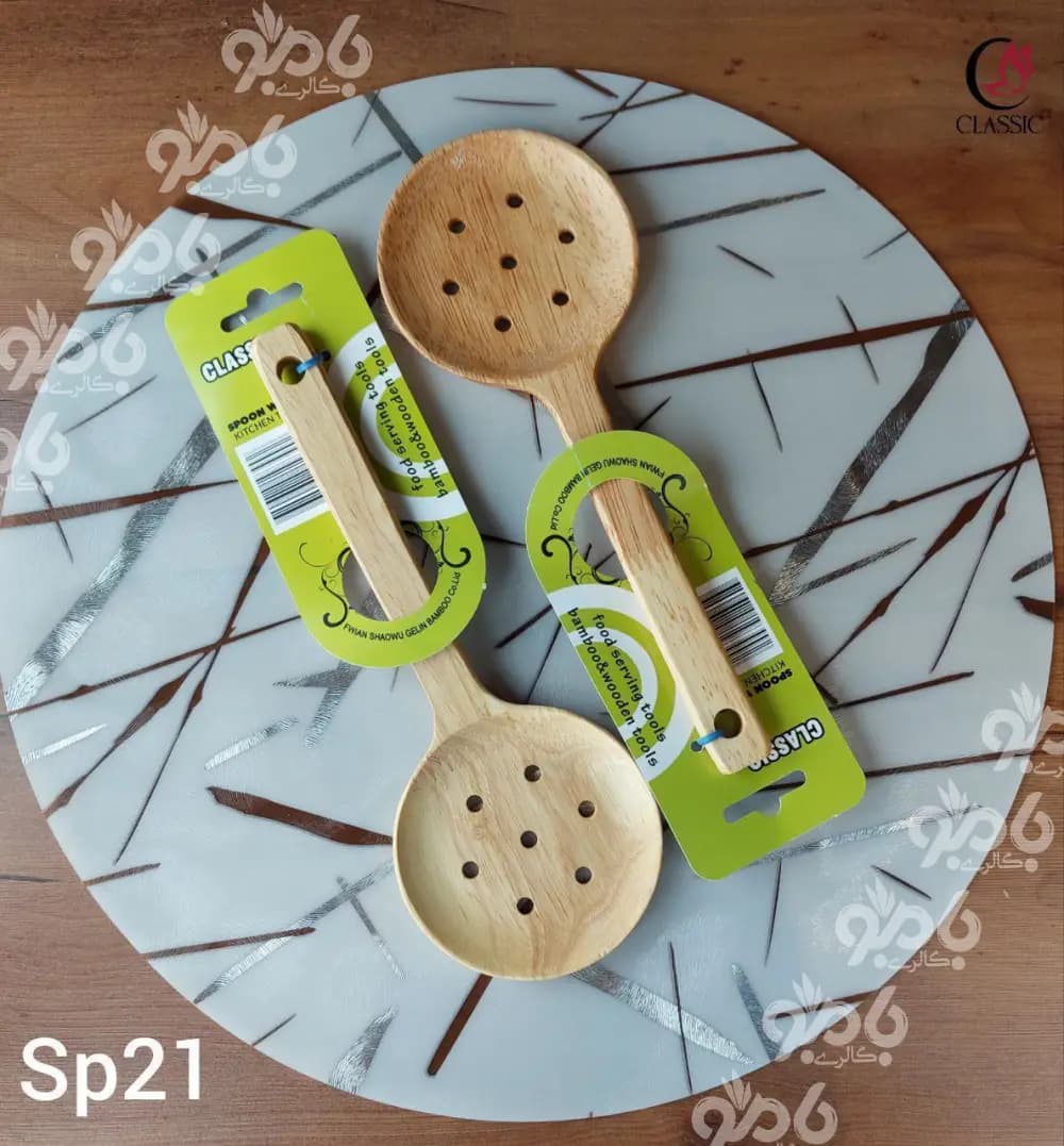 کفگیر چوبی کلاسیک رابر گرد سوراخ پهن 25*9 کدsp21 — تصویر ۲