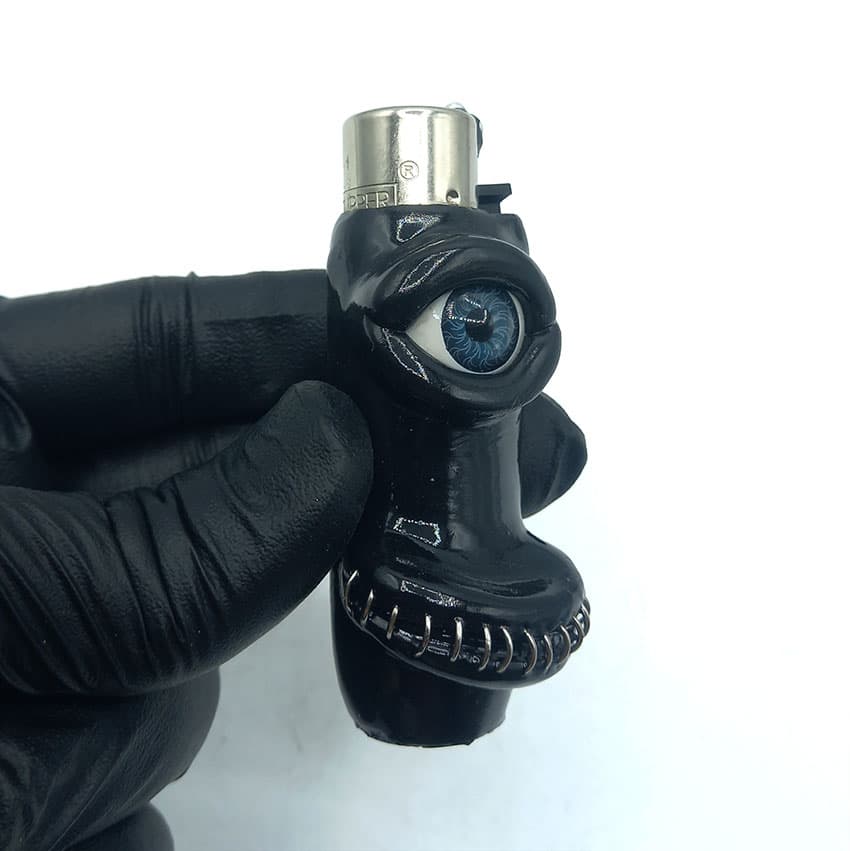 فندک فانتزی کلیپر اصل خمیری مدل تک چشم مشکی d101 — تصویر ۲