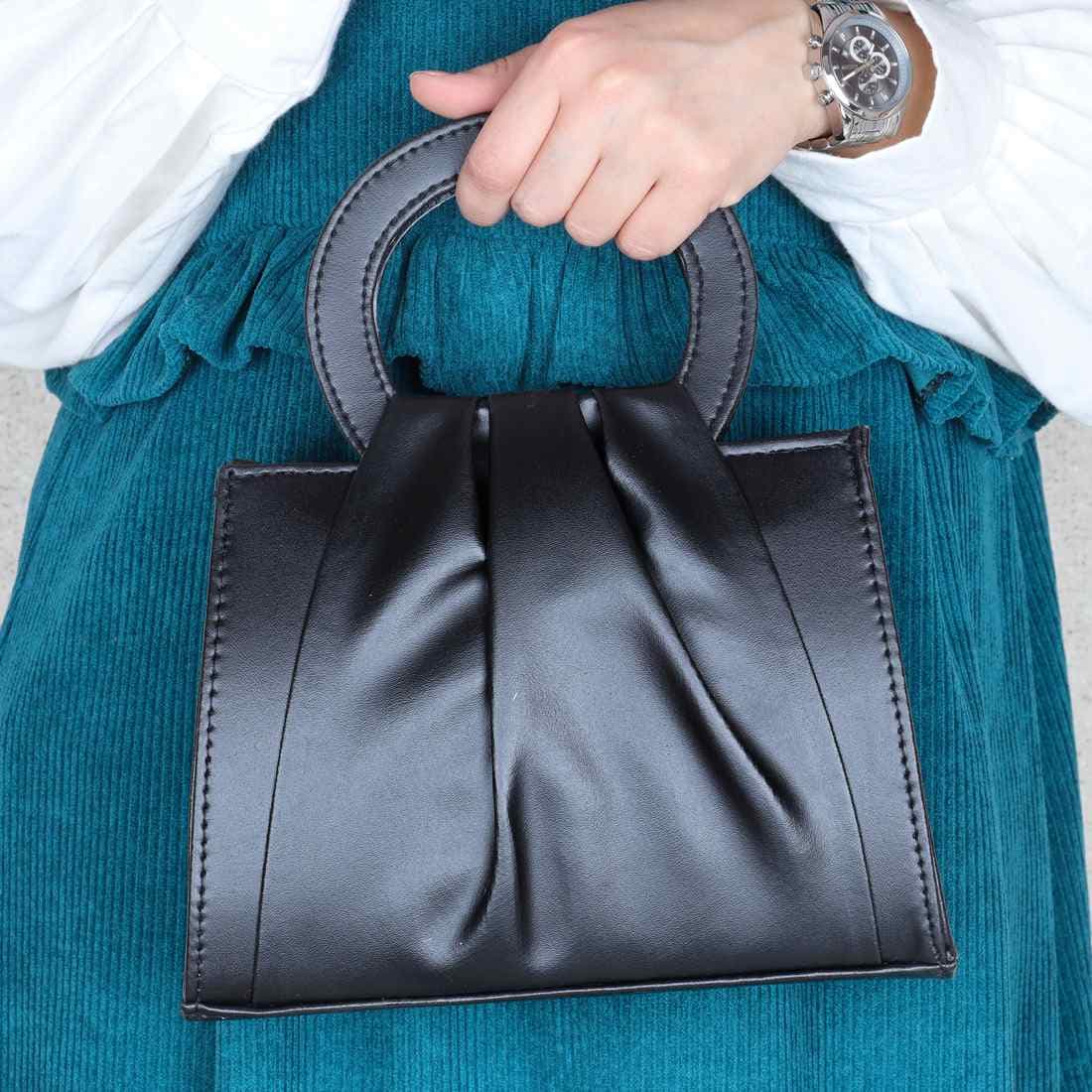 کیف پلیسه دستی