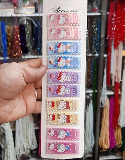 گیره مو دخترانه تق تقی کیتی 10عددی کد5 — تصویر ۲