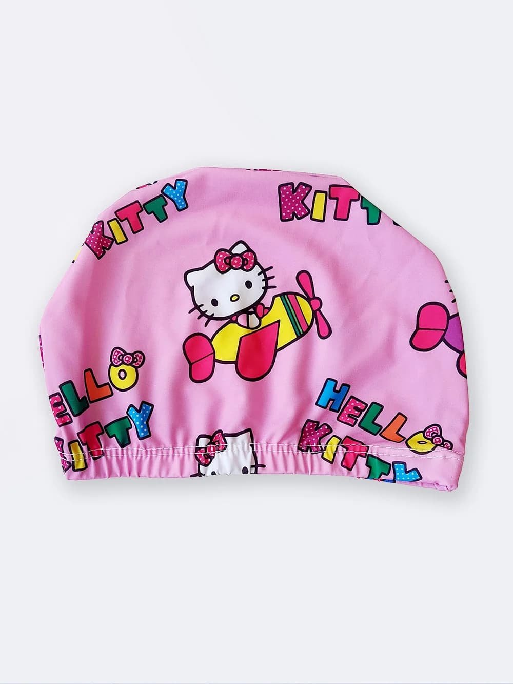 مایو دخترانه بچه گانه پادار نیمه پوشیده با کلاه اسپیدو ( Speedo ) به رنگ صورتی — تصویر ۵