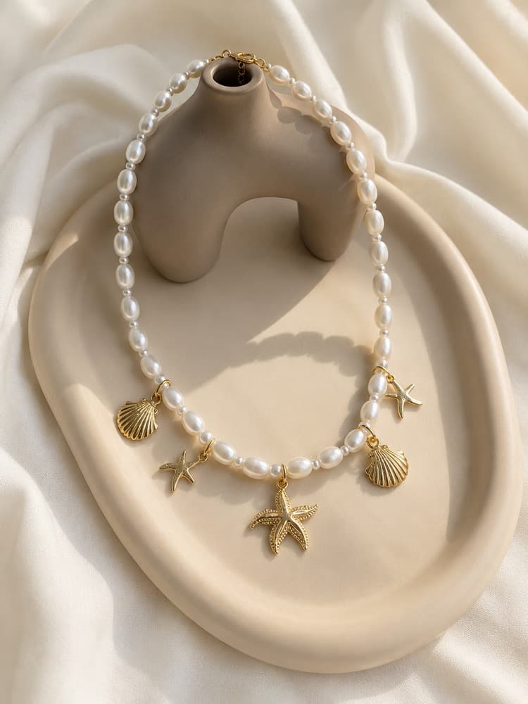 گردنبند مروارید چارم دار صدف و ستاره