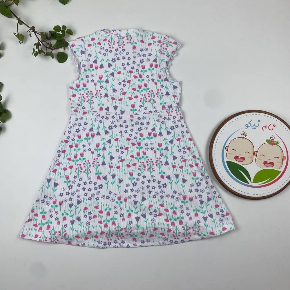 پیراهن نوزادی دخترانه آستین حلقه ای طرح گل گلی یقه گرد سفید رنگ – 12 تا 24 ماه — تصویر ۲