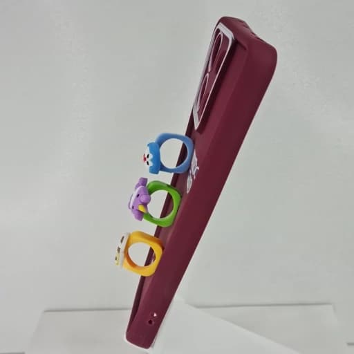 گارد گوشی Redmi not 13 4g عروسکی فانتزی برجسته جا انگشتی مدل پاپ سوکت رنگ زرشکی — تصویر ۲