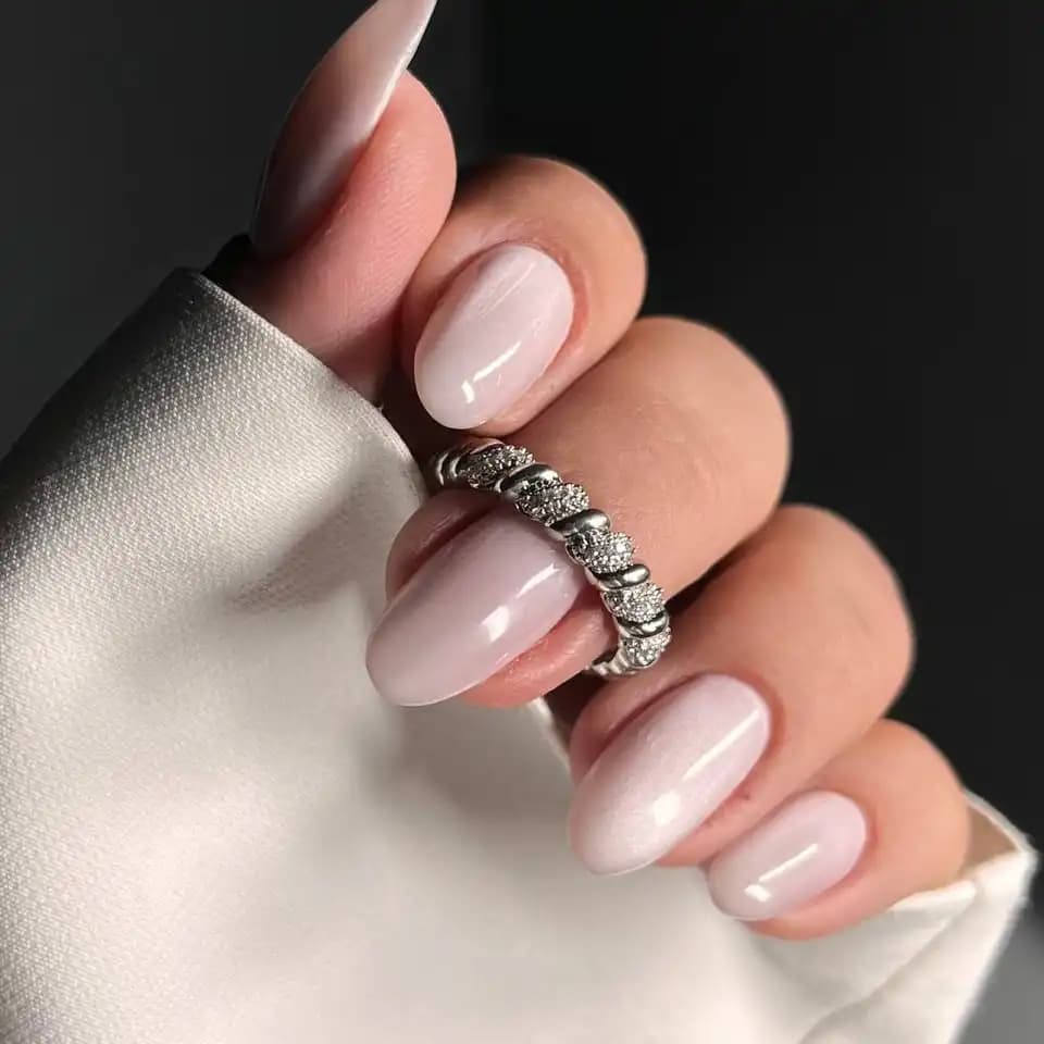انگشتر زنانه و دخترانه جواهری طرح پیچ خورده رنگ نقره ای ضد حساسیت رنگ کاملا ثابت کد atk — تصویر ۲