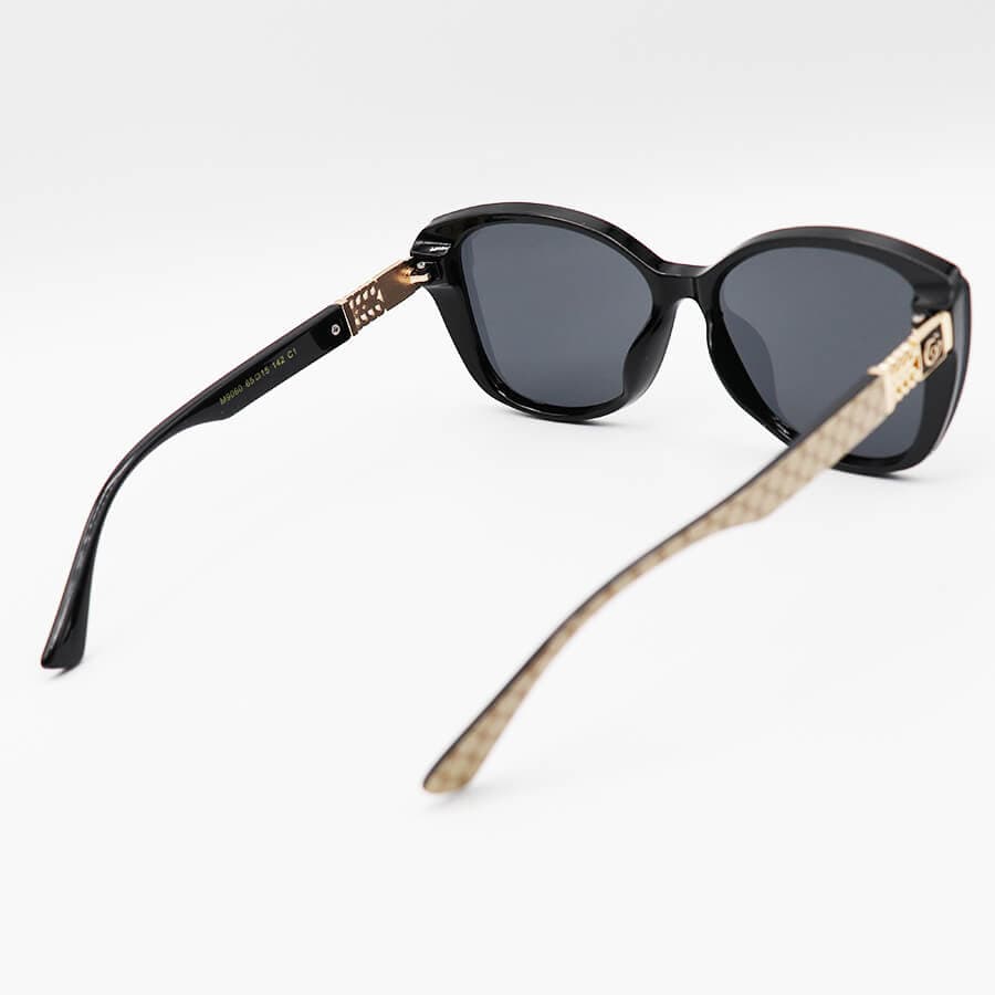 عینک آفتابی زنانه GUCCI با فریم مشکی رنگ، چشم گربه ای شکل و لنز دودی تیره مدل M9060 — تصویر ۳