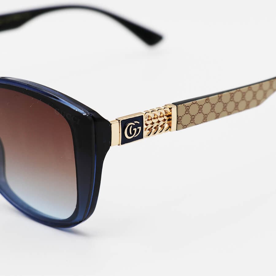 عینک آفتابی زنانه GUCCI با فریم مشکی رنگ، چشم گربه ای شکل و لنز دودی تیره مدل M9060 — تصویر ۱۰
