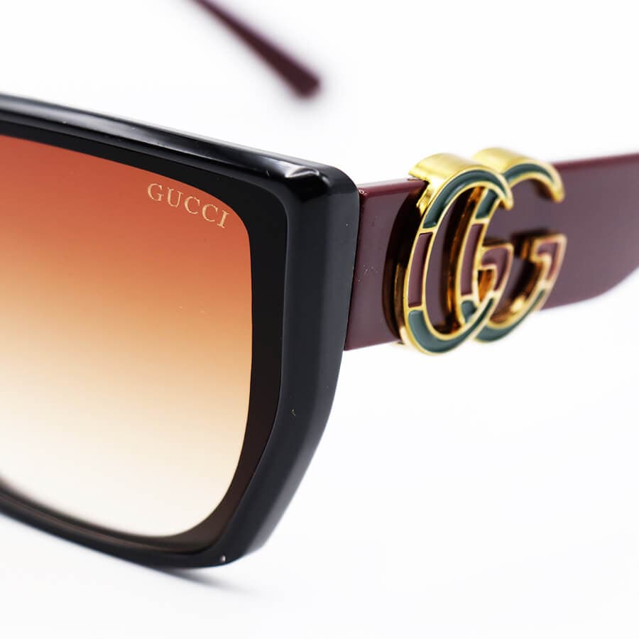 عینک آفتابی GUCCI با فریم مشکی رنگ، پروانه ای شکل، دسته زرشکی و لنز قهوه ای مدل M9055 — تصویر ۵