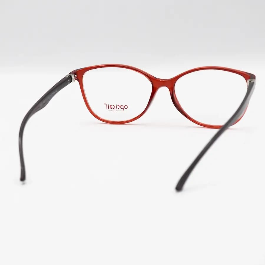 عینک طبی Opticall با فریم رنگ قرمز، بیضی شکل، جنس TR، دسته قهوه‌ای و ساخت ترکیه مدل MOD128 — تصویر ۳