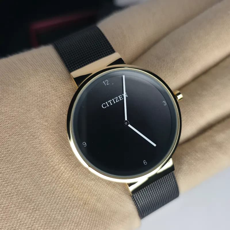 ساعت مچی عقربه ای مردانه سیتیزن مشکی طلایی مدل S1298G — تصویر ۵