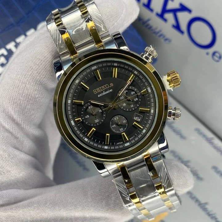 ساعت سیکو مردانه سه موتوره سیکو اکسکلوسیو مدل 3155 رنگ نقره ای طلایی صفحه مشکی