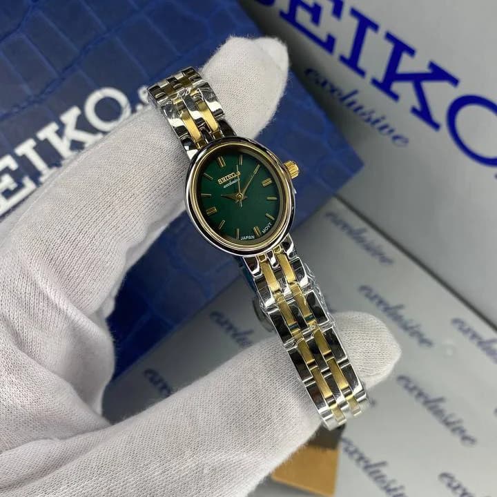 ساعت سیکو زنانه سیکو اکسکلوسیو مدل 3160 رنگ نقره ای طلایی صفحه سبز