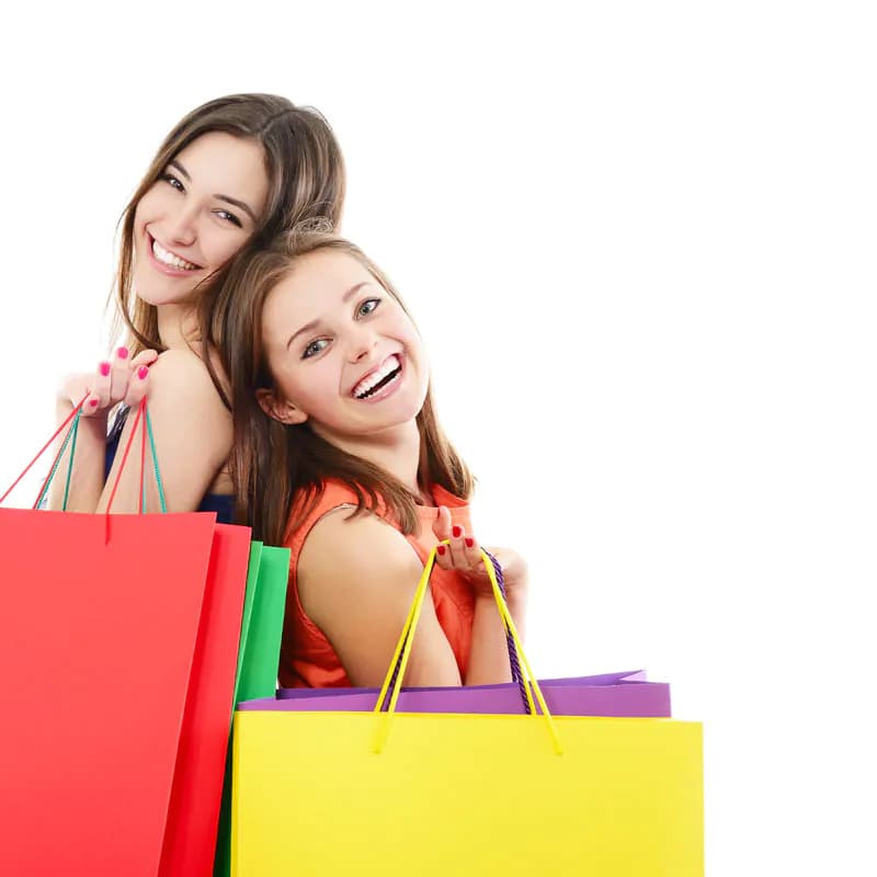عکس استوک دخترهای خوشحال با بگ های خرید
