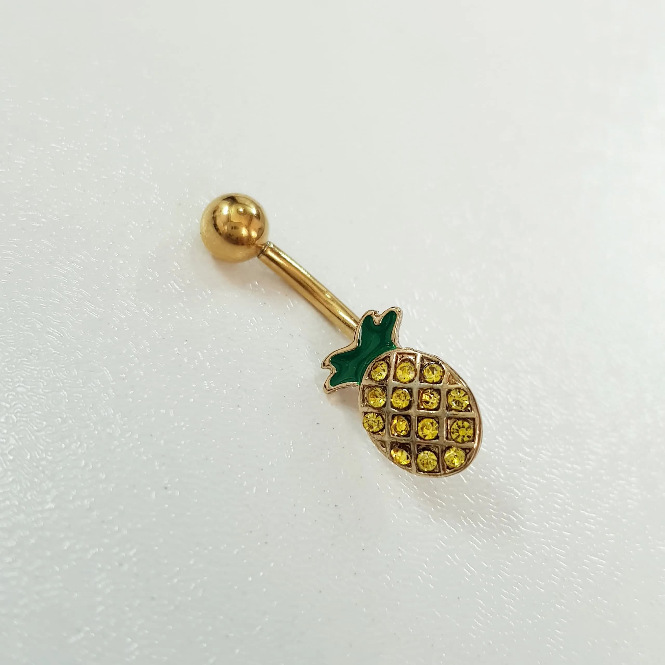 پیرسینگ ناف طلایی آناناس نگین دار جنس استیل جراحی (Surgical Steel) — تصویر ۵