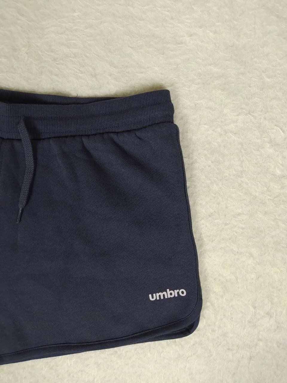 شورتک ورزشی زنانه برند umbro کد WE0335 — تصویر ۷