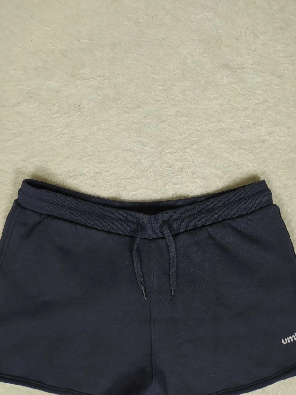 شورتک ورزشی زنانه برند umbro کد WE0335 — تصویر ۸