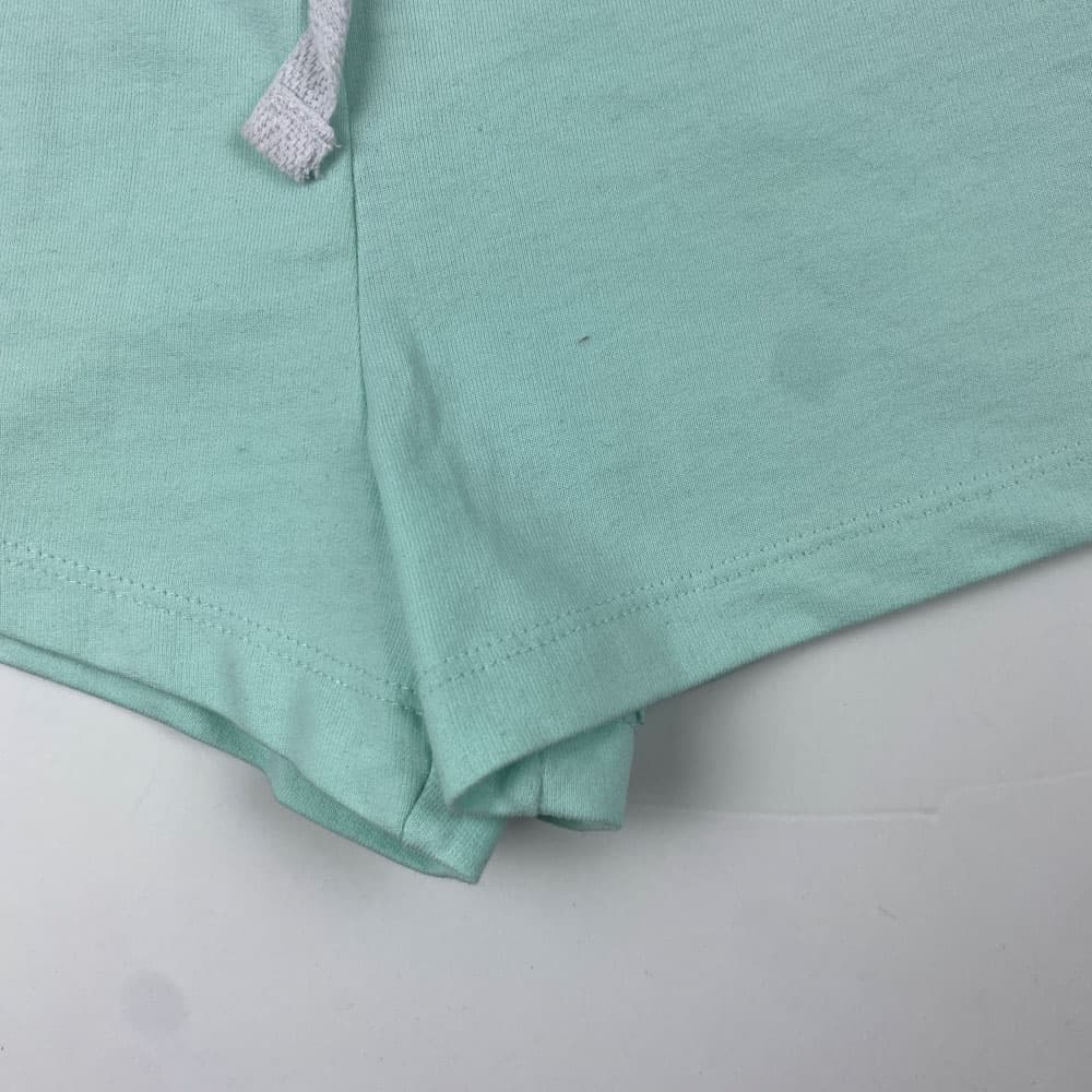 شلوارک دخترانه طرح جیب دار کمرکش سبز پاستیلی رنگ — تصویر ۵