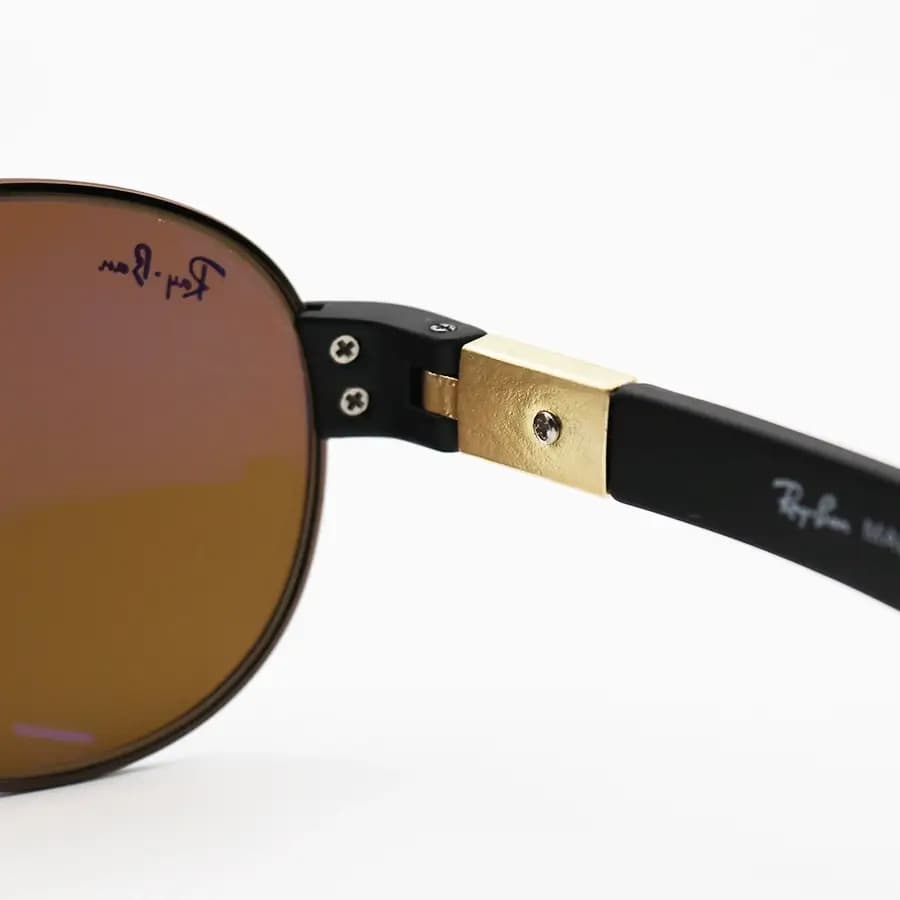عینک آفتابی Ray-Ban با فریم شکل خلبانی، رنگ مسی، عدسی شیشهای و قهوهای تیره مدل RB3509 — تصویر ۴