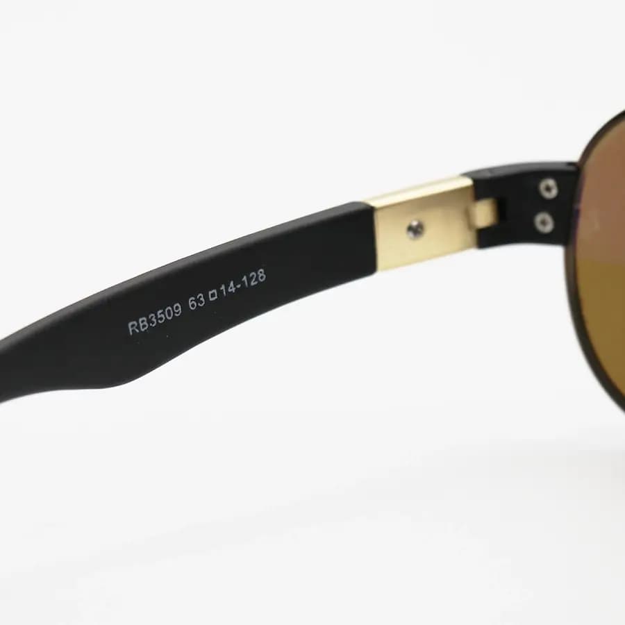 عینک آفتابی Ray-Ban با فریم شکل خلبانی، رنگ مسی، عدسی شیشهای و قهوهای تیره مدل RB3509 — تصویر ۶