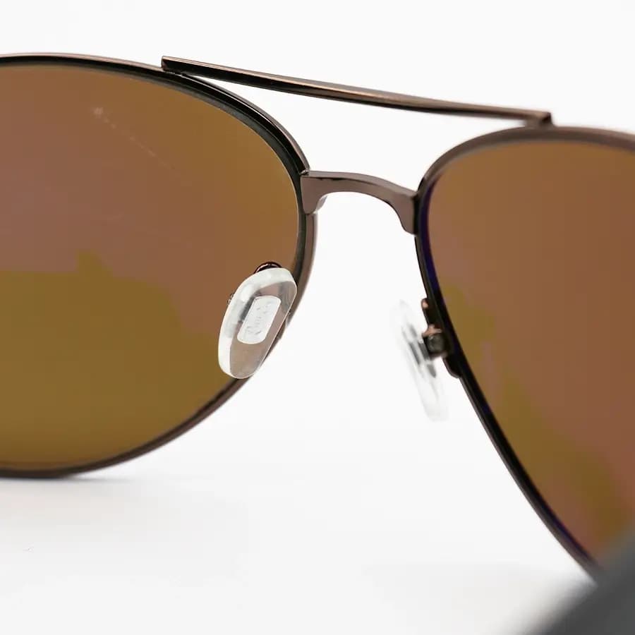 عینک آفتابی Ray-Ban با فریم شکل خلبانی، رنگ مسی، عدسی شیشهای و قهوهای تیره مدل RB3509 — تصویر ۷