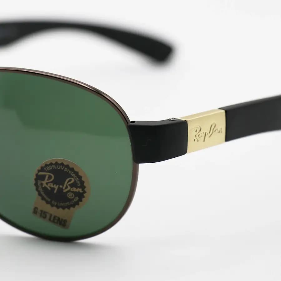 عینک آفتابی Ray-Ban با فریم شکل خلبانی، رنگ مسی، عدسی شیشهای و قهوهای تیره مدل RB3509 — تصویر ۱۲
