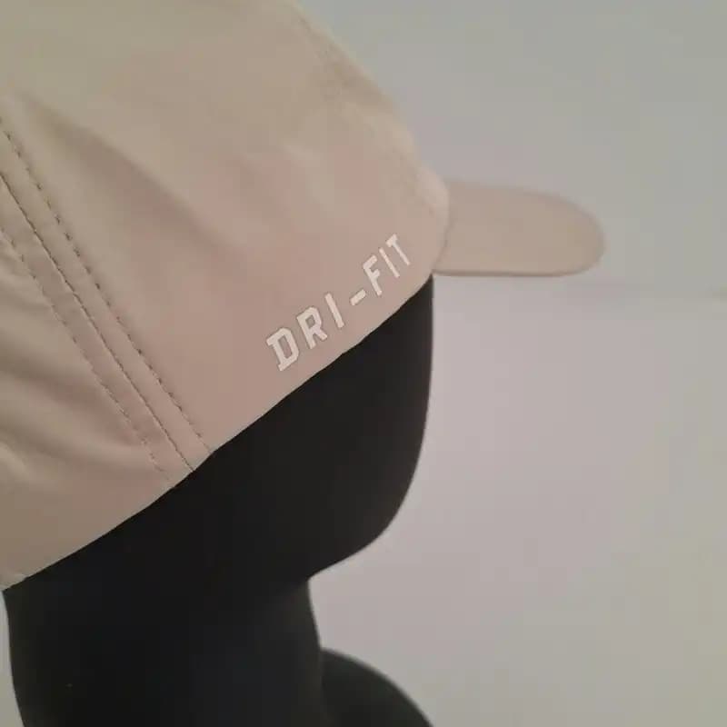 کلاه ورزشی شمعی نایک کرم DRI-FIT — تصویر ۵