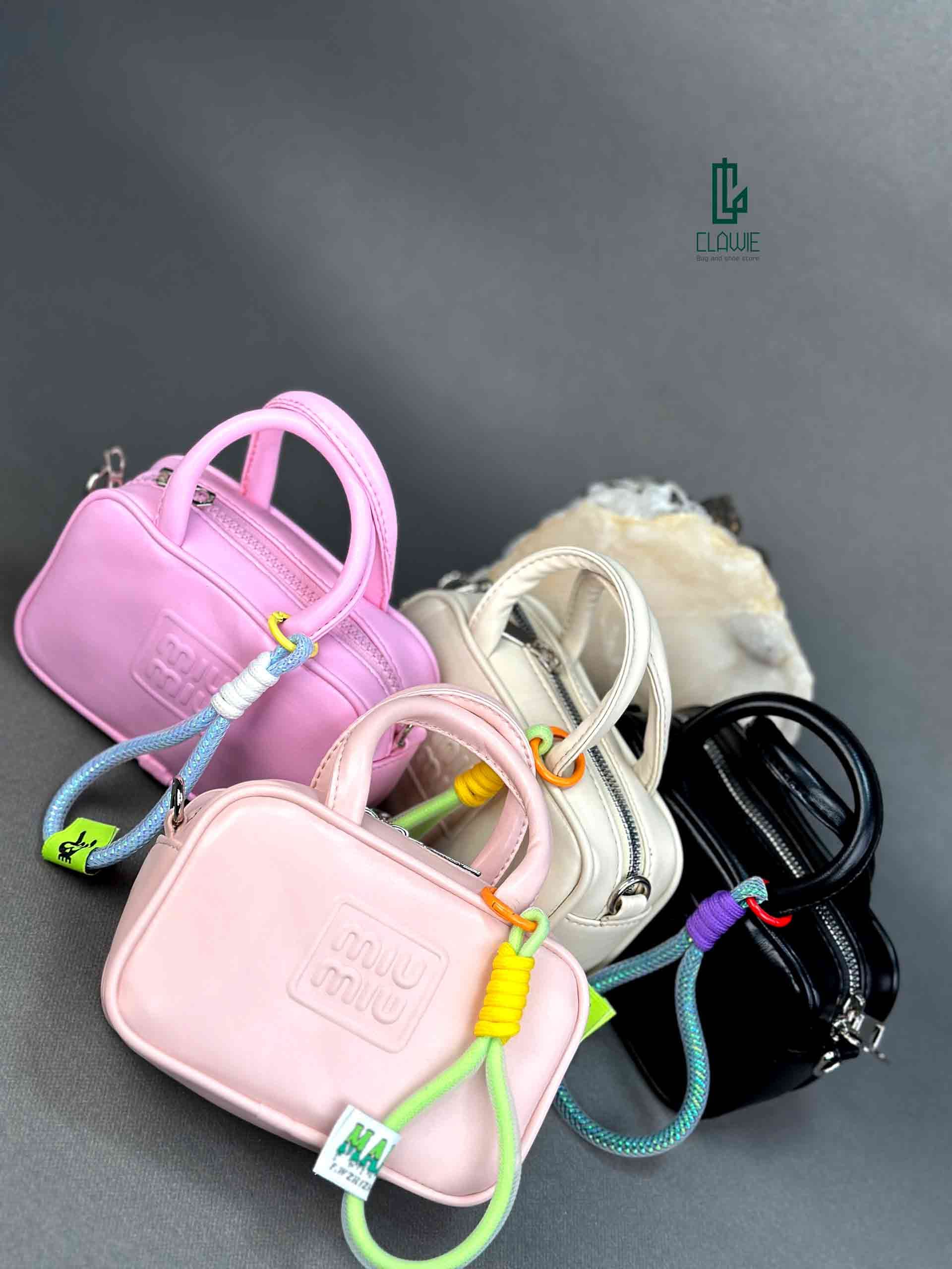 👝 کیف پاسپورتی : miumiu — تصویر ۲