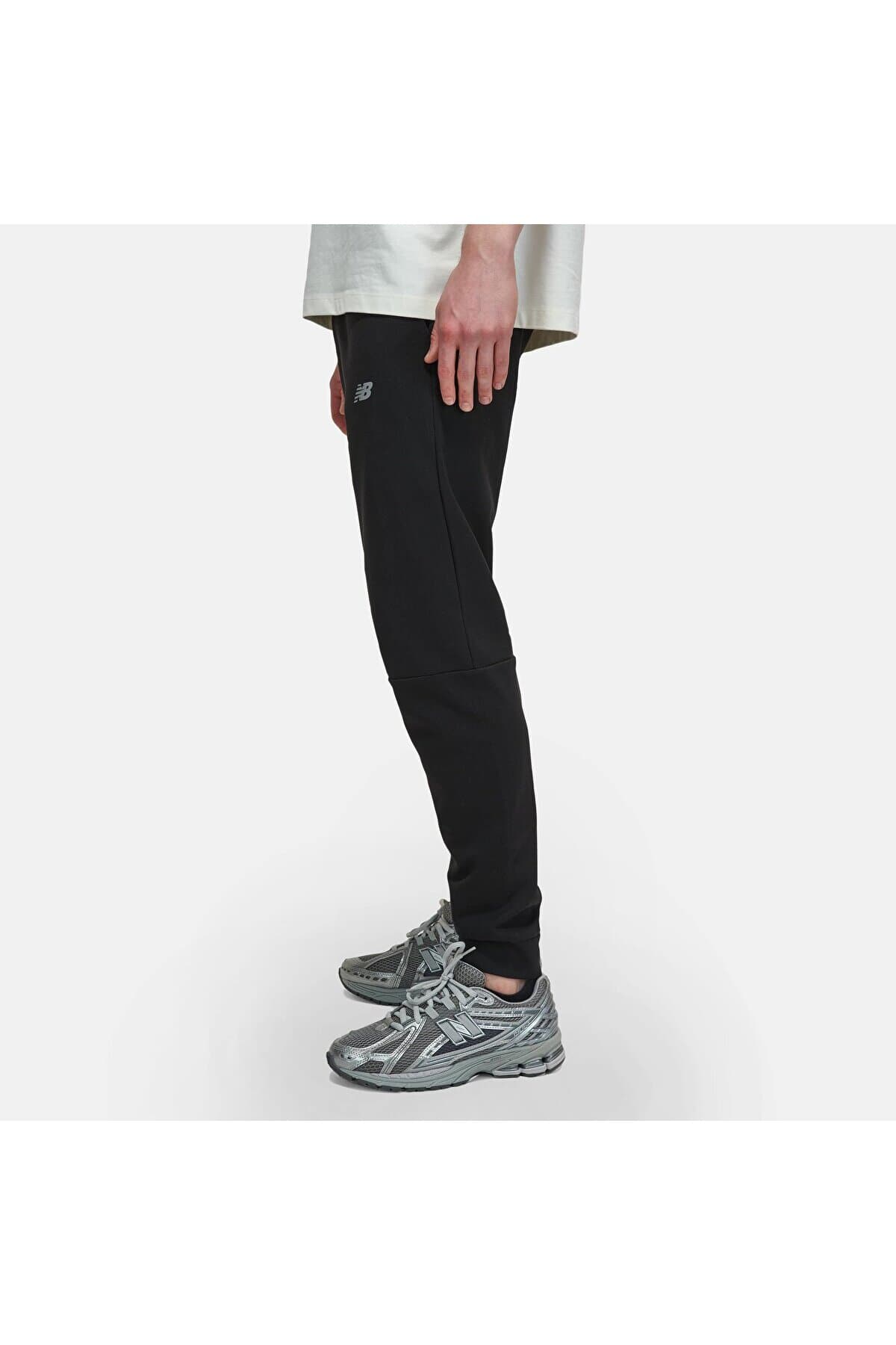 شلوار گرمکن ورزشی نیو بالانس مردانه پاموک مشکی فاق نرمال جاگر Daily/روزانه | New Balance APP137 TR — تصویر ۴