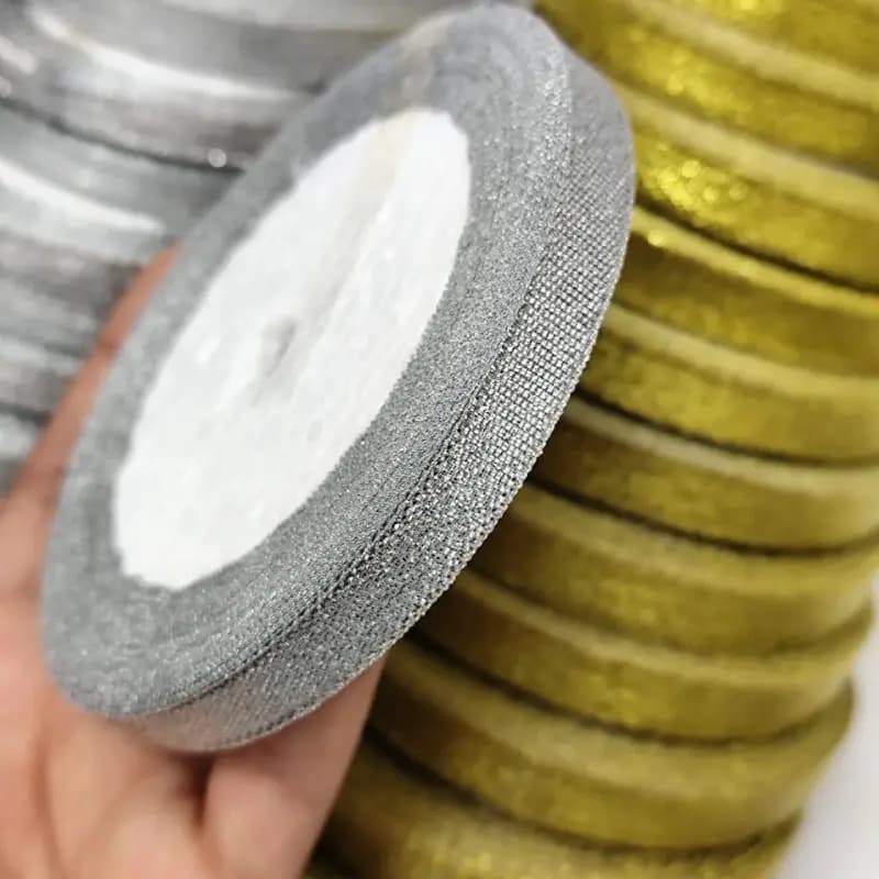 روبان زری دار نقره ای یک سانت (1رول)