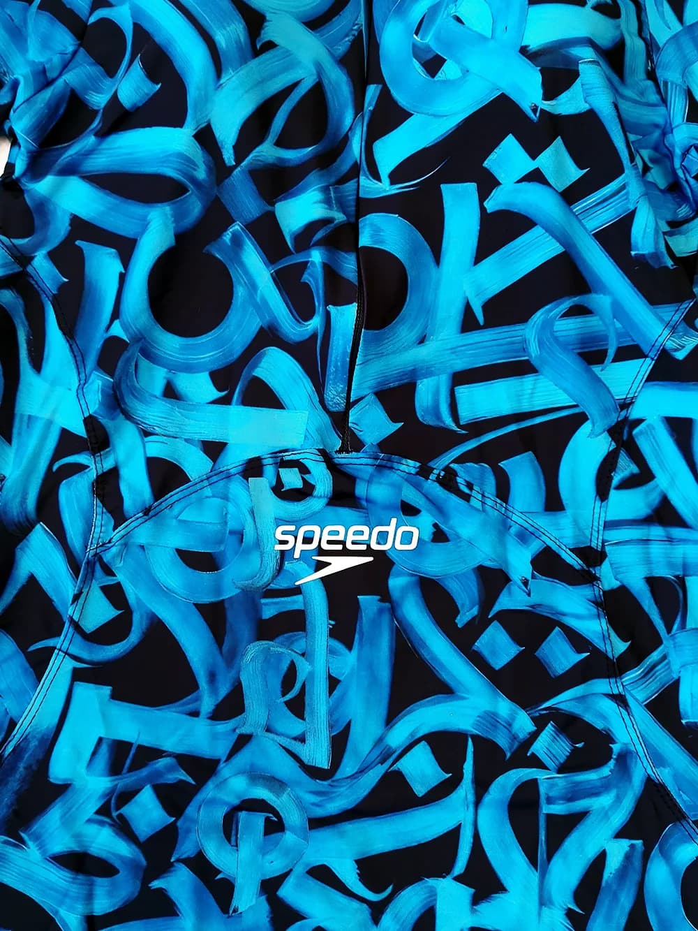 مایو پوشیده برای استخر زنانه پادار و آستین دار شیک اسپیدو ( Speedo ) بصورت کاپدار — تصویر ۵