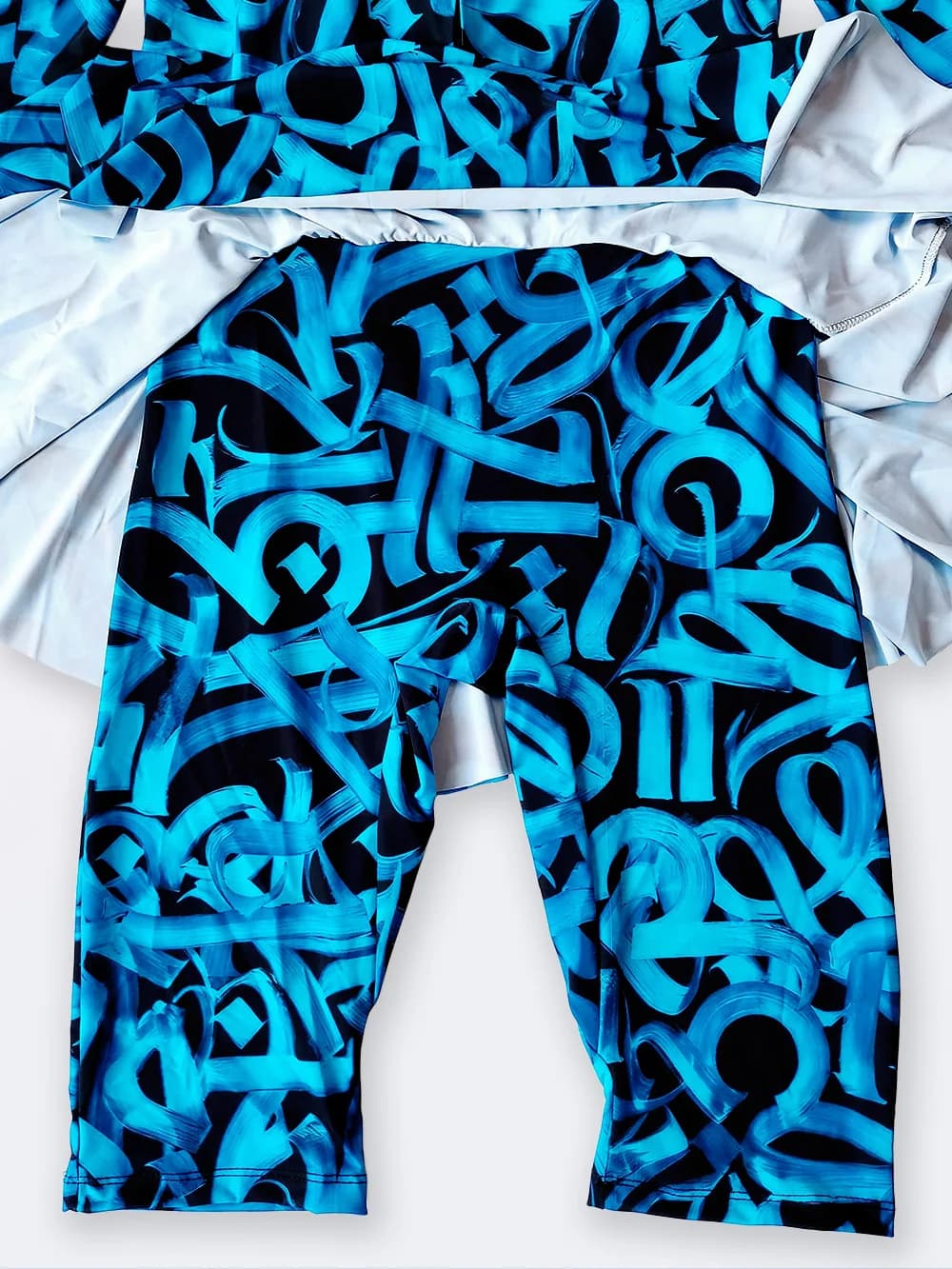 مایو اسلامی نیمه پوشیده زنانه دامنی کاپ دار اسپیدو ( Speedo ) شلوارک دار آبی — تصویر ۷