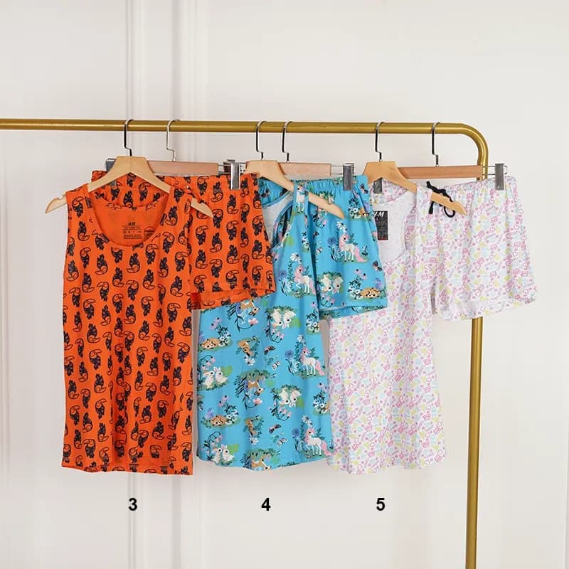 ست دو تیکه تاپ شورتک زنانه طرحدار برند H&M — تصویر ۳