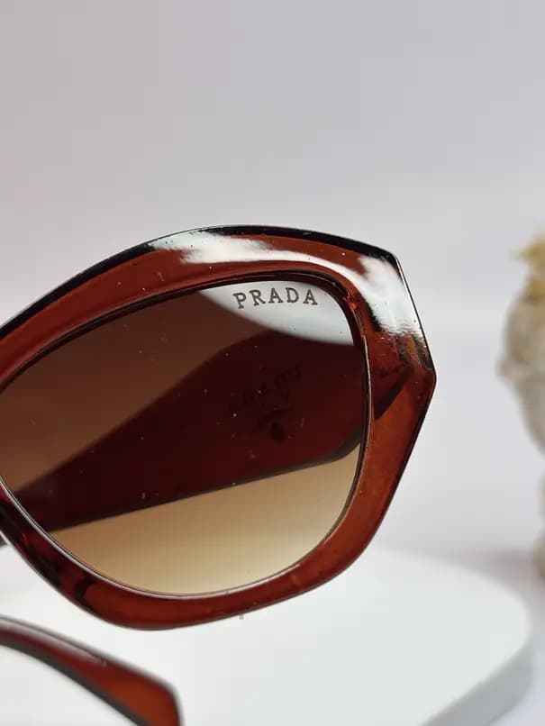 عینک آفتابی اورجینال prada یووی 400 فریم کائوچو رز گلد — تصویر ۲