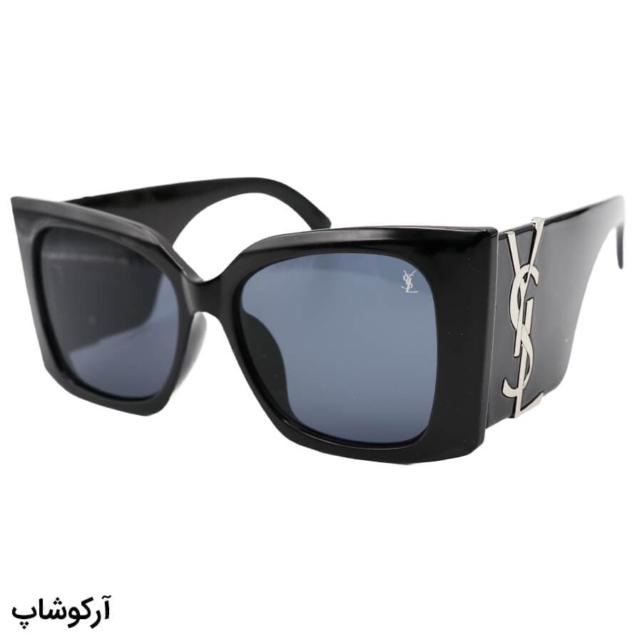 عینک آفتابی فانتزی YSL با فریم مشکی براق رنگ، اور سایز، دسته پهن و لنز دودی تیره مدل 23015