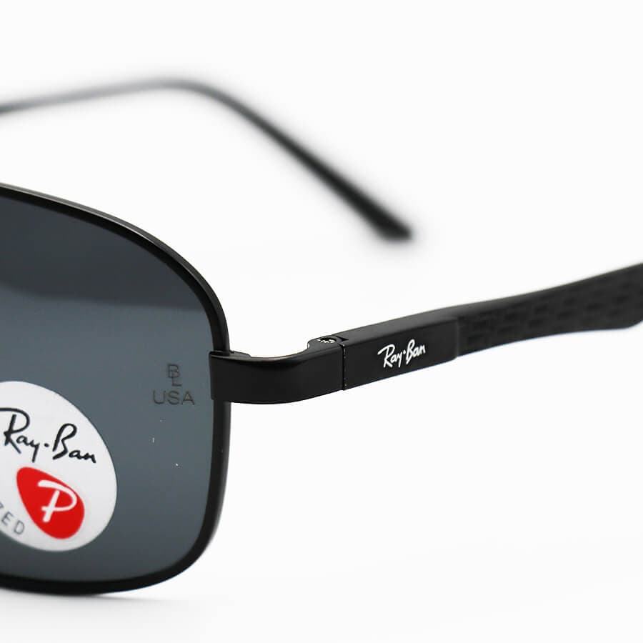 عینک آفتابی Ray-Ban با فریم مستطیلی، مشکی رنگ، دسته فنری و لنز دودی و پلاریزه مدل P3001 — تصویر ۵