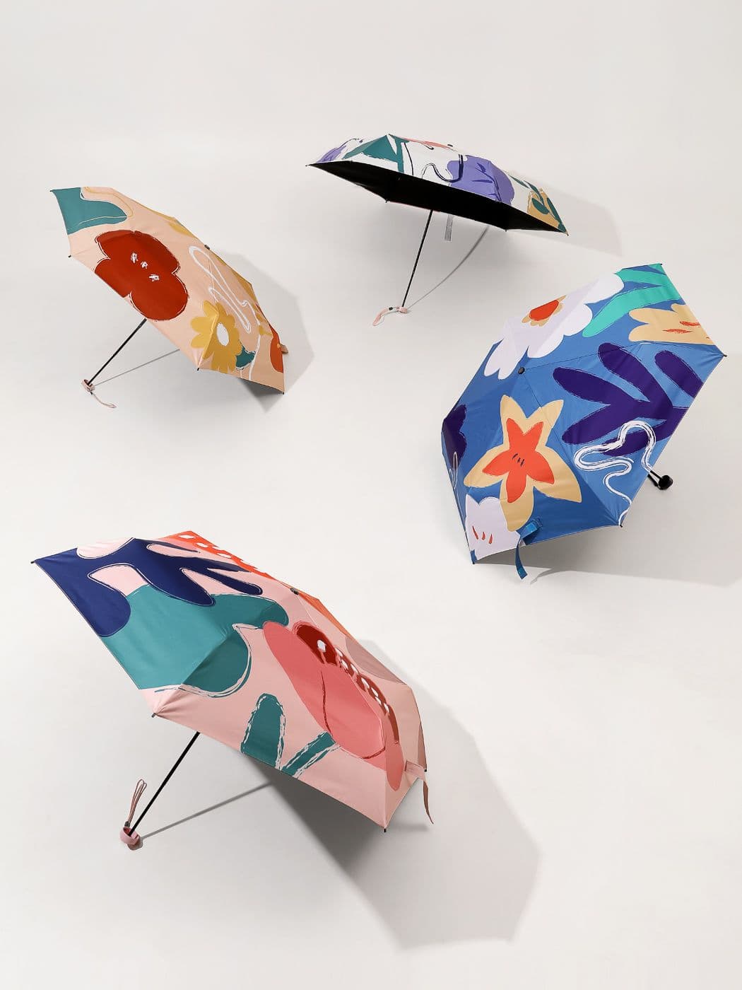 چتر ضد اشعه خورشید و ضد آب مینیسو، مدل Miniso Flowers Pattern Light Sunscreen Umbrella (white)، سفید گلدار، 55 سانتی متر — تصویر ۸
