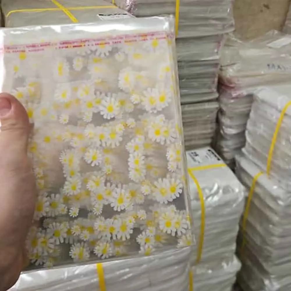 سلفون لبه چسب دار شفاف طرح گل بابونه (سایز بندی) بسته 1 کیلویی — تصویر ۲