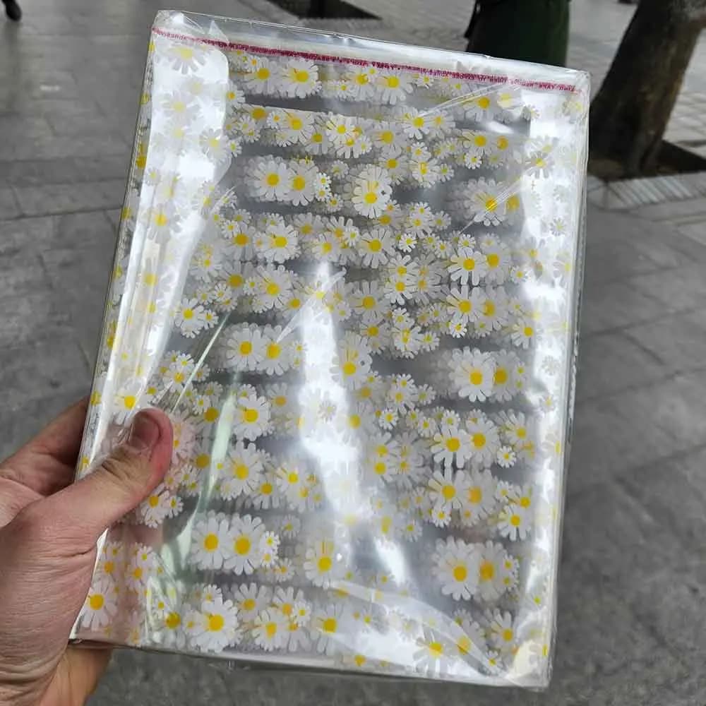 سلفون لبه چسب دار شفاف طرح گل بابونه (سایز بندی) بسته 1 کیلویی — تصویر ۳
