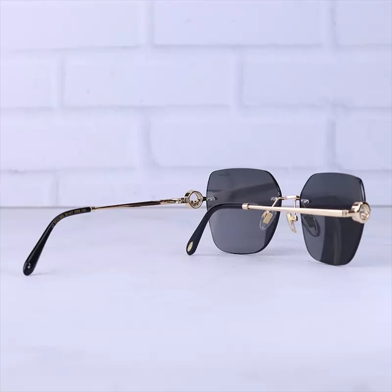 عینک آفتابی شوپارد زنانه بدون فریم عدسی مشکی SCHL 29S 0300 — تصویر ۳